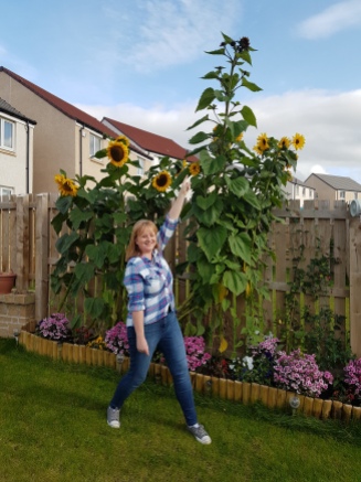 Excuse the daft pose to show the scale of the flowers!